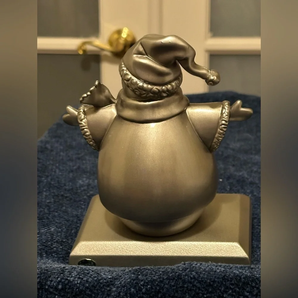 Silver snowman stocking holder. So cute!